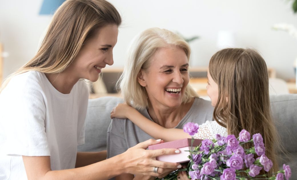 Family with Flowers smiling